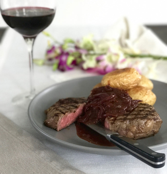 Grilled Steak with Red Wine and Onion Gravy